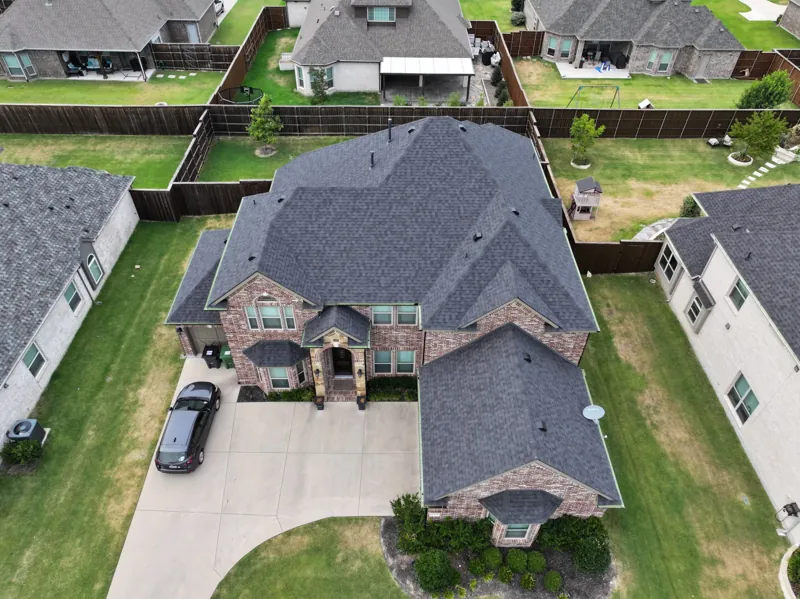 completed roof replacement on a large DFW home