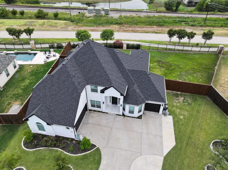 aerial view of a new roof with pool by Infinite Roofing